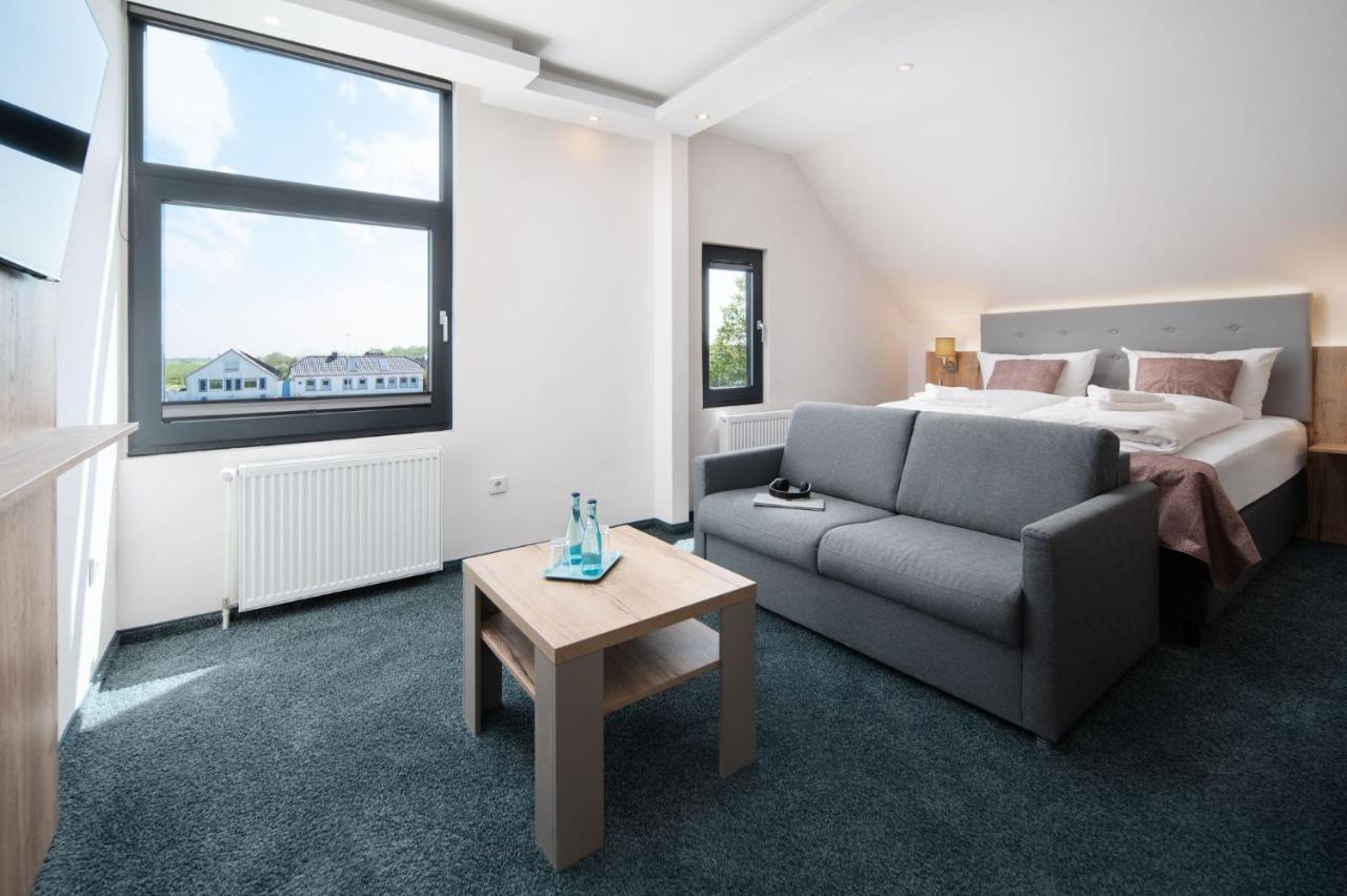 Nordseehotel Tausendschoen Carolinensiel Ruang foto