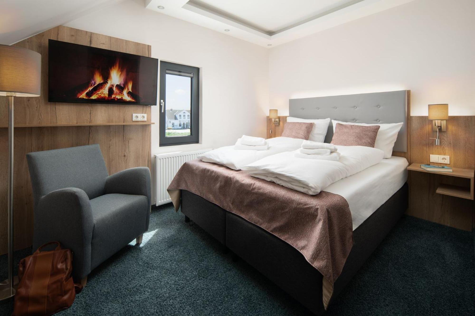 Nordseehotel Tausendschoen Carolinensiel Ruang foto